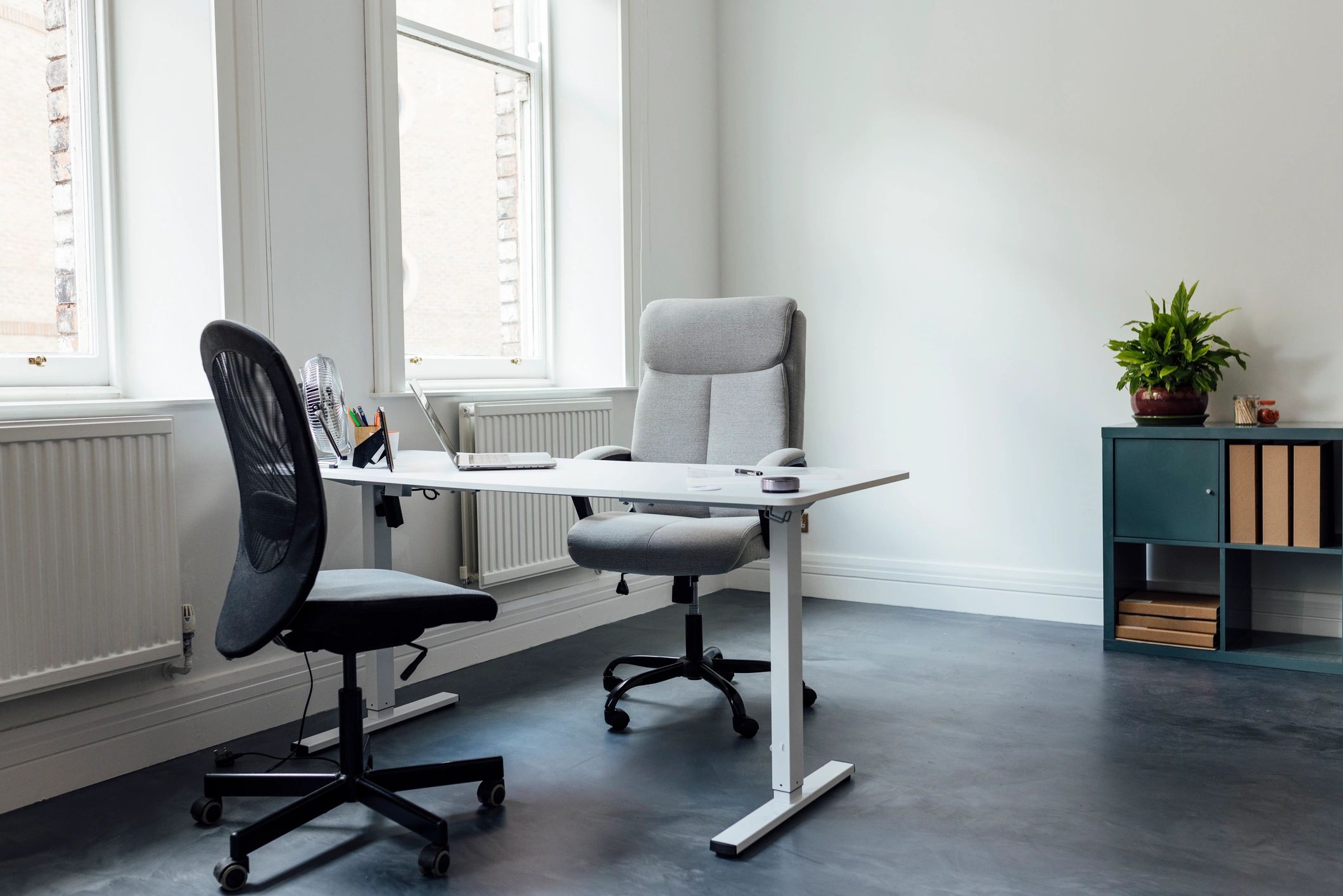 Modern developer workspace with desk and office equipment