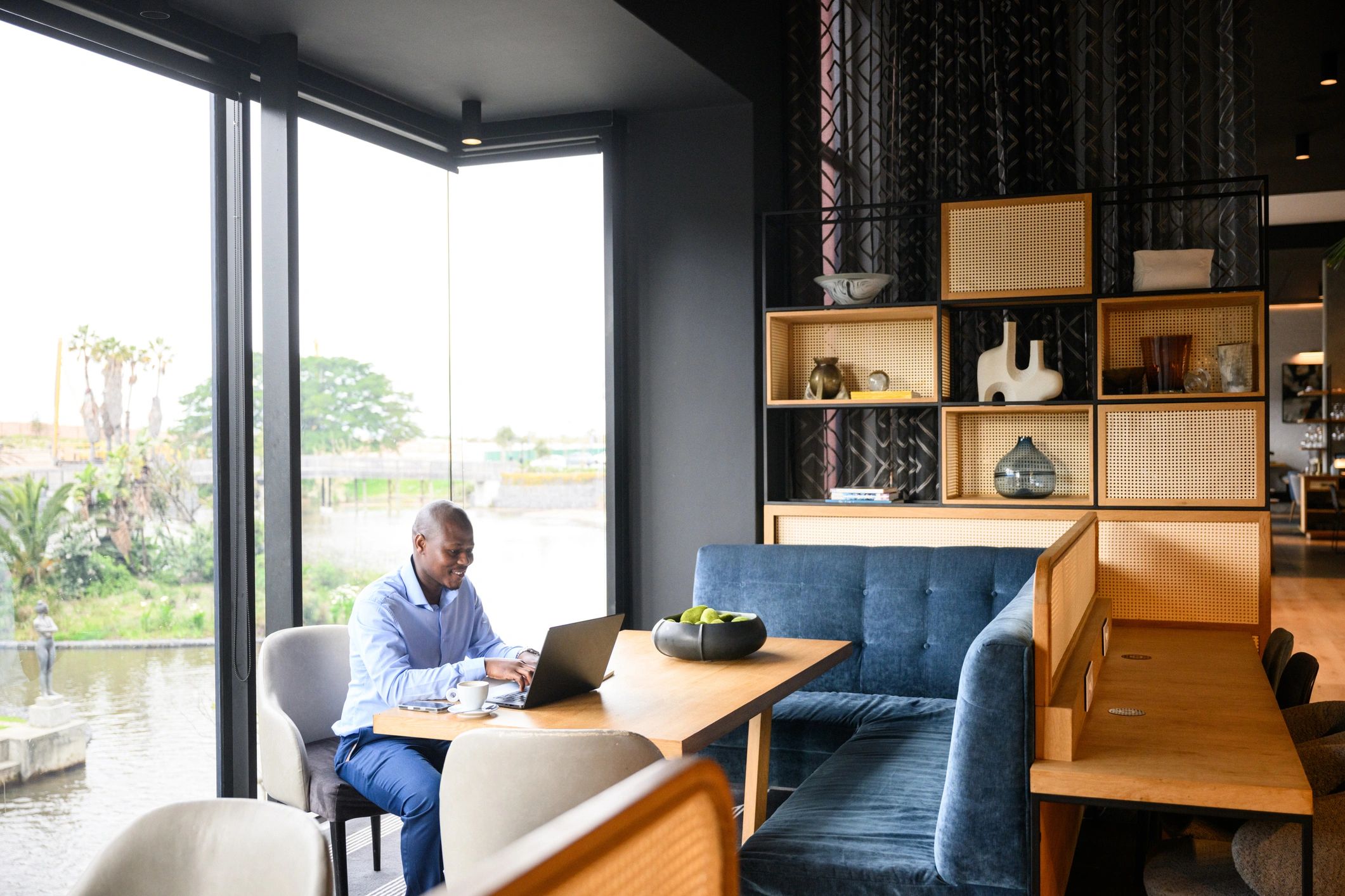 Professional working on a laptop in a contemporary office